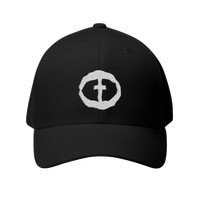Front view of the black Flexfit Men's Cap with a white circular cross logo on the front, product shot on white.