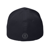 Back view of the dark navy Flexfit Men's Cap with a small white RS emblem at the nape, product shot on white.