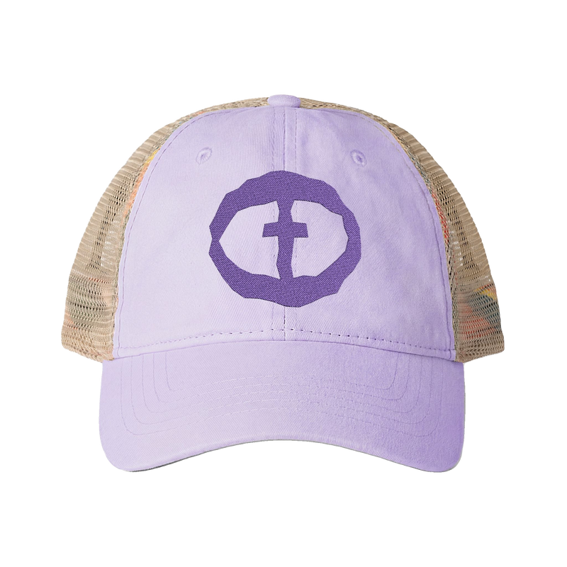 Front view of the lavender Tess Women's Ponytail Cap with a dark-purple circular cross logo and tan mesh back, product shot on white.