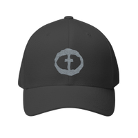Front view of the dark grey Flexfit Men's Cap with a light-gray circular cross logo on the front, product shot on white.