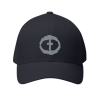 Front view of the dark navy Flexfit Men's Cap with a light-gray circular cross logo on the front, product shot on white.