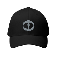 Front view of the black Flexfit Men's Cap with a light-gray circular cross logo on the front, product shot on white.