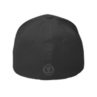 Back view of the dark grey Flexfit Men's Cap with a small outlined light-gray circular cross logo at the nape, product shot on white.