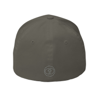 Back view of the olive Flexfit Men's Cap with a small outlined light-gray circular cross logo at the nape, product shot on white.