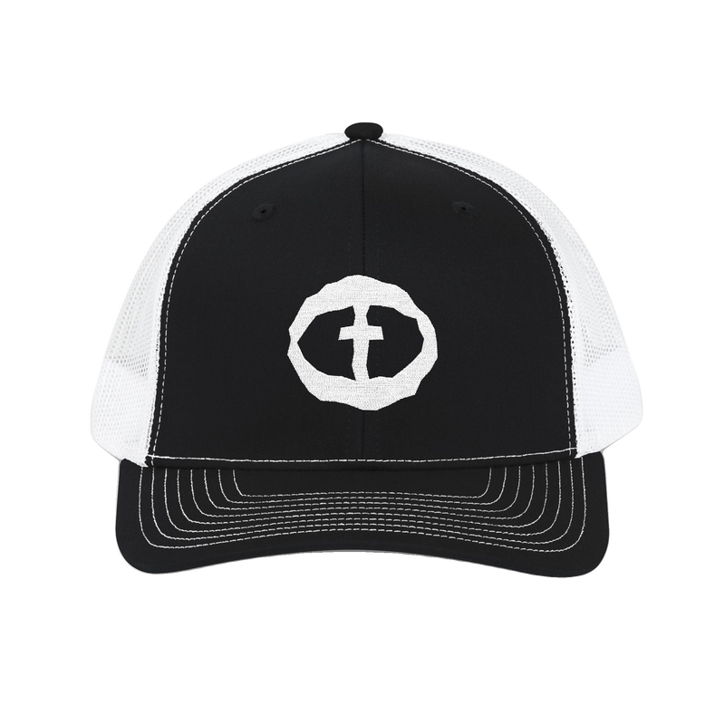 Front view of the black-and-white Richardson 112 Cap with a white circular cross logo on the front panel, product shot on white.