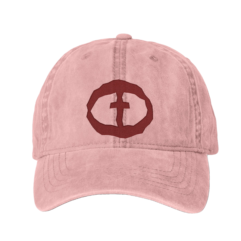 Front view of the dusty pink Cassie Women's Ponytail Cap with a maroon embroidered circular cross logo, product shot on white.