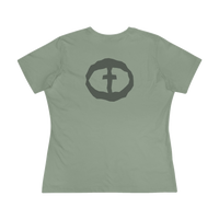 Front view of the sage Women's Rock and Salvation Tee with a large gray rock-textured circular cross logo on the chest, ghost-mannequin on white.