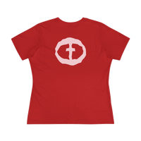 Front view of the red Women's Pink Rock and Salvation Tee with a large light-pink distressed circular cross logo on the chest, ghost-mannequin on white.