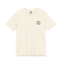 Front view of the natural Men's Rock and Salvation Lightweight Tee with a small gray rock-textured circular cross logo on the left chest, ghost-mannequin on white.