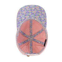 Interior view of the dusty pink / floral Cassie Women's Ponytail Cap Small Graphic - Pink.