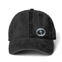 Front view of the black / leopard Women's Ponytail Cap Small Graphic - Black.