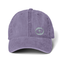 Front view of the violet / floral Women's Ponytail Cap Small Graphic - Violet.